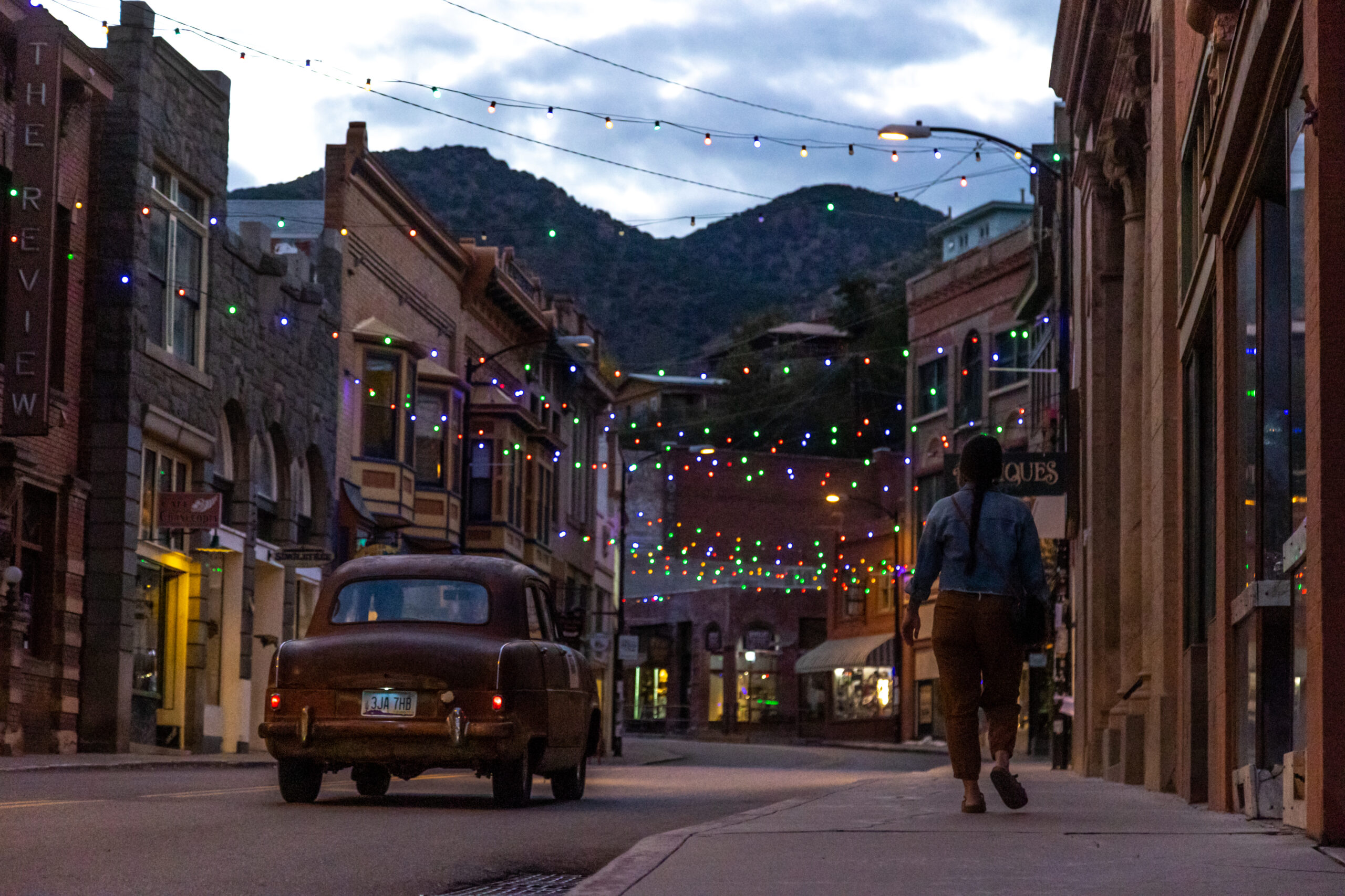 Kirk_Rasmussen_Bisbee_AZ-pedestrian walking up Main at night